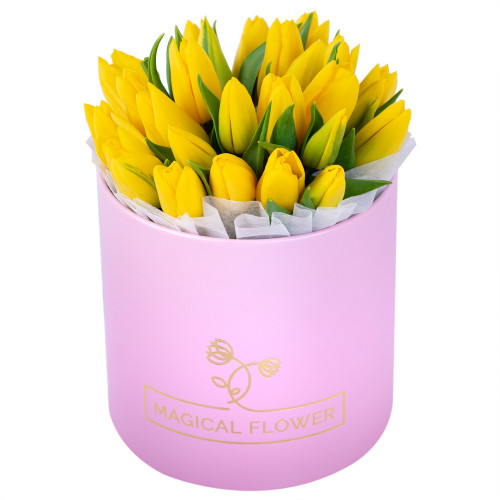 Весенний букет из 25 желтых тюльпанов в розовой шляпной коробке